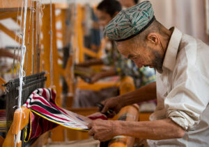 Uyghur worker in a silk factory, Hotan, Xinjiang Uyghur Autonomous Region, China