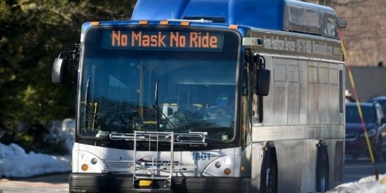 GettyImages-1304112041 bus mask sign